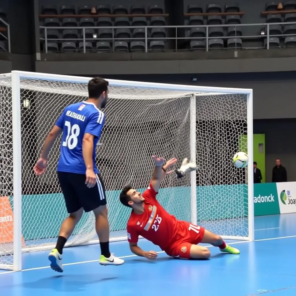 Thủ môn futsal Nhật Bản cản phá cú sút của Iran